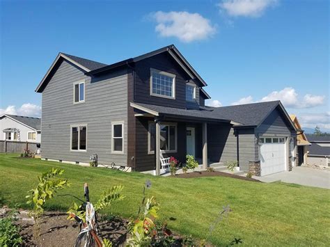 simple homes with charcoal siding